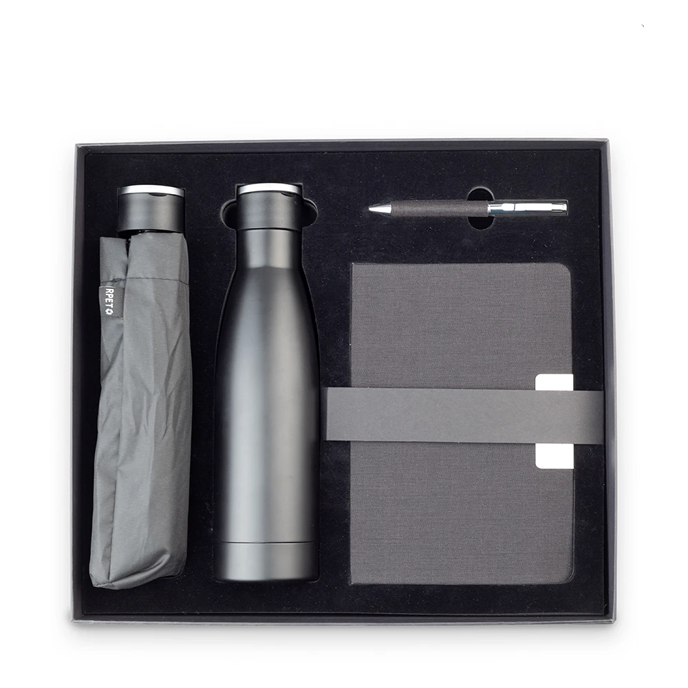 kit cuaderno, lapicero, un termo y un paraguas